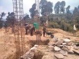 The stones for foundation are being carried from afar